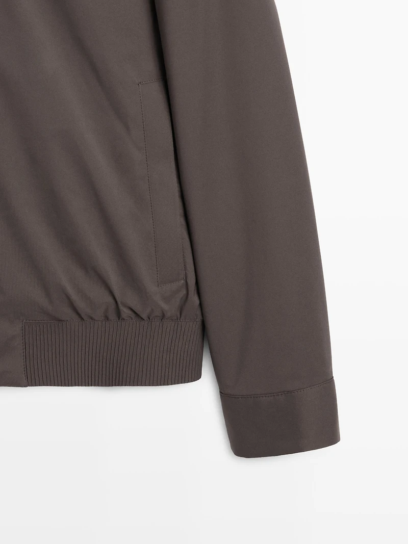 Water-repellent bomber jacket with hem detail