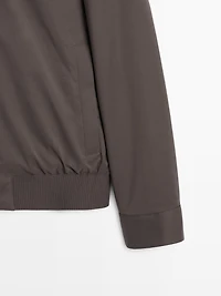Water-repellent bomber jacket with hem detail