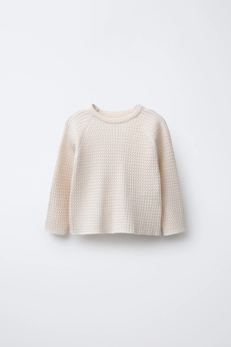 CABLE KNIT SWEATER