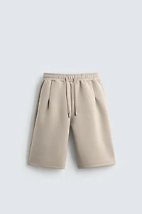 SHORT LONG EFFET NÉOPRÈNE À PINCES