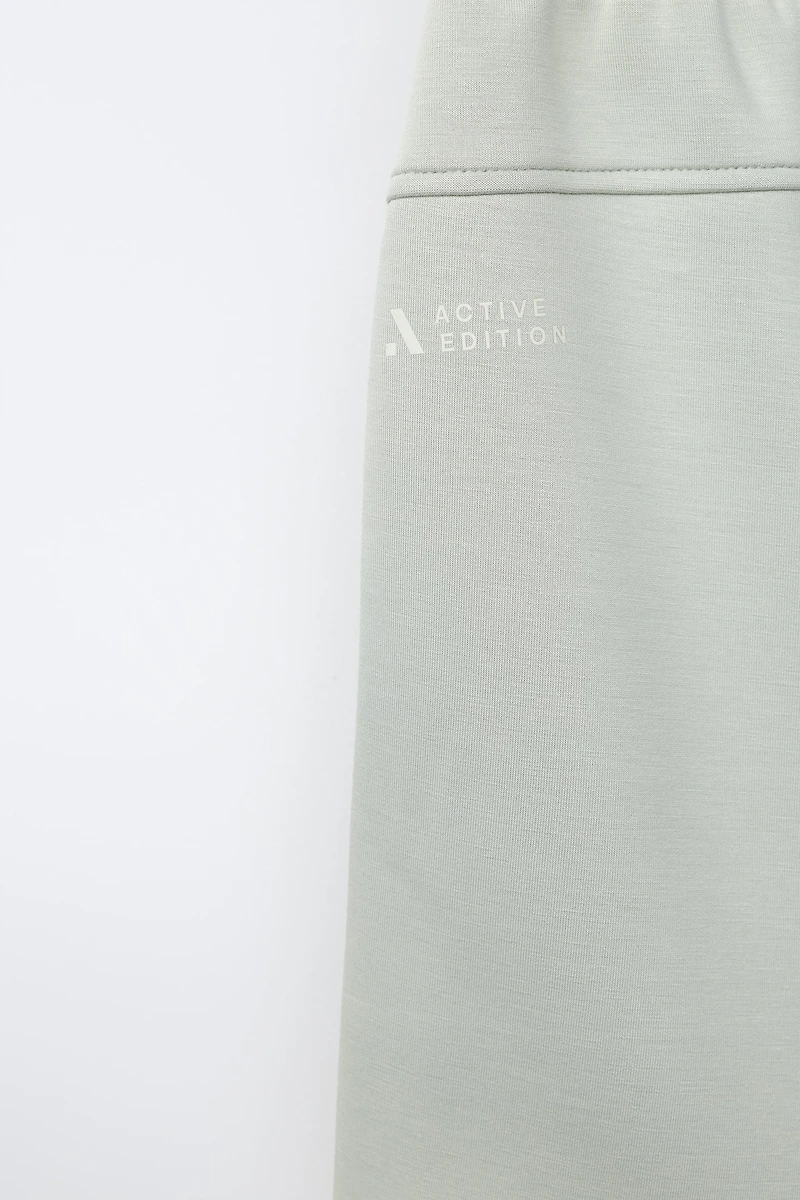 PIPED ATHLETIC SHORTS