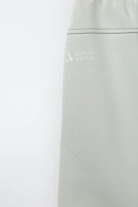 PIPED ATHLETIC SHORTS