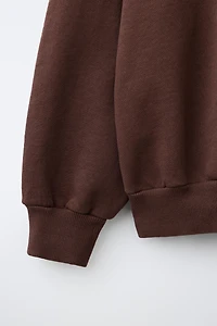 SWEAT ZIPPÉ PUKAS SURF