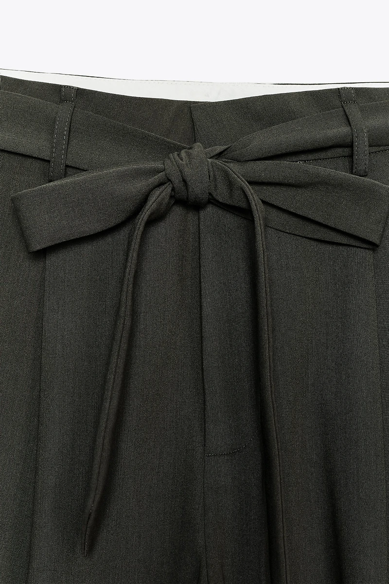 PLEATED BELTED PANTS