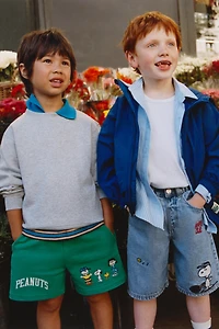 SNOOPY PEANUTS™ EMBROIDERED PLUSH SHORTS