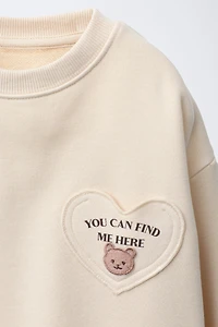 HEART POCKET SWEATSHIRT