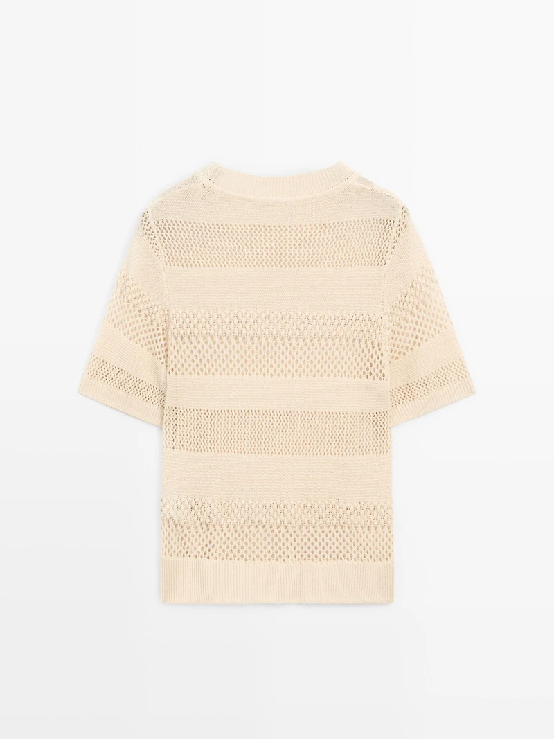 Top en maille ajourée à manches courtes