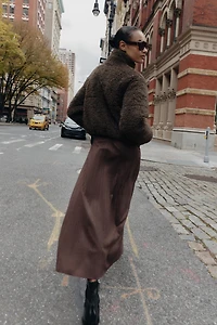 SUEDE EFFECT PLEATED MIDI SKIRT WITH BELT