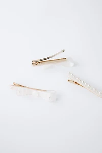 PACK OF THREE MOTHER-OF-PEARL HAIR CLIPS WITH BOWS AND PEARLS