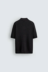 STRUCTURED FLOWY KNIT POLO
