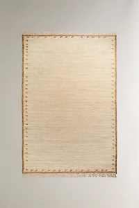 JUTE AND COTTON AREA RUG WITH FRINGING