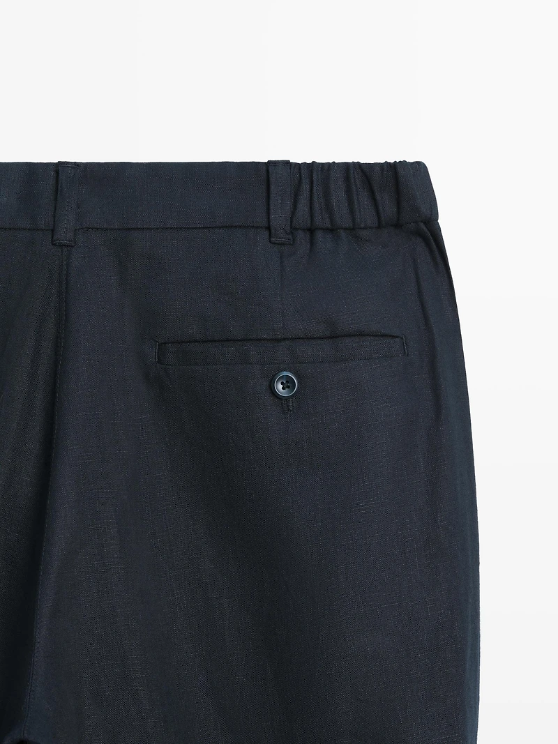 Tapered fit linen trousers