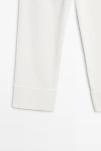 Mid-waist capris with turn-up hems