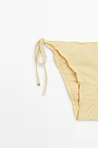 Bas de bikini à volants et liens