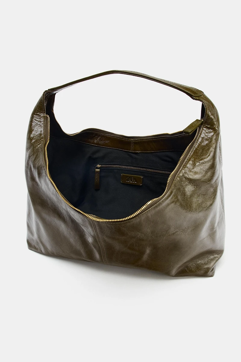 LEATHER OVAL BAG
