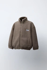 BLOUSON EFFET MOUTON BRODÉ