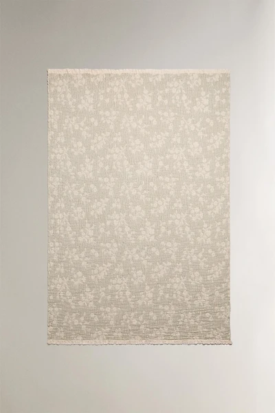 FLORAL JACQUARD BLANKET