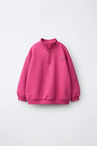 RUBBERIZED HEART INTERLOCK SWEATSHIRT