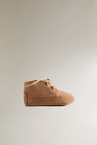 CHAUSSON BOTTE LACETS CUIR