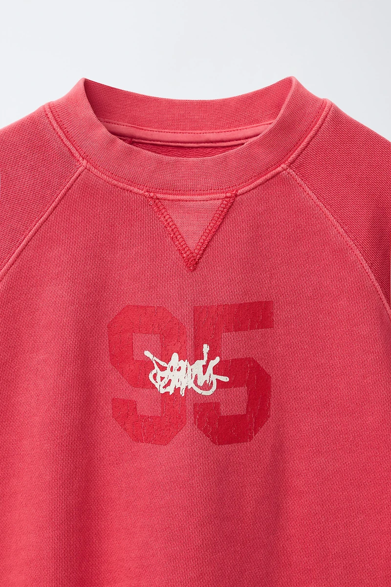 NUMBER AND GRAFFITI SWEATSHIRT