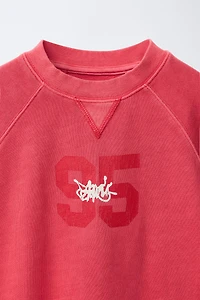 NUMBER AND GRAFFITI SWEATSHIRT