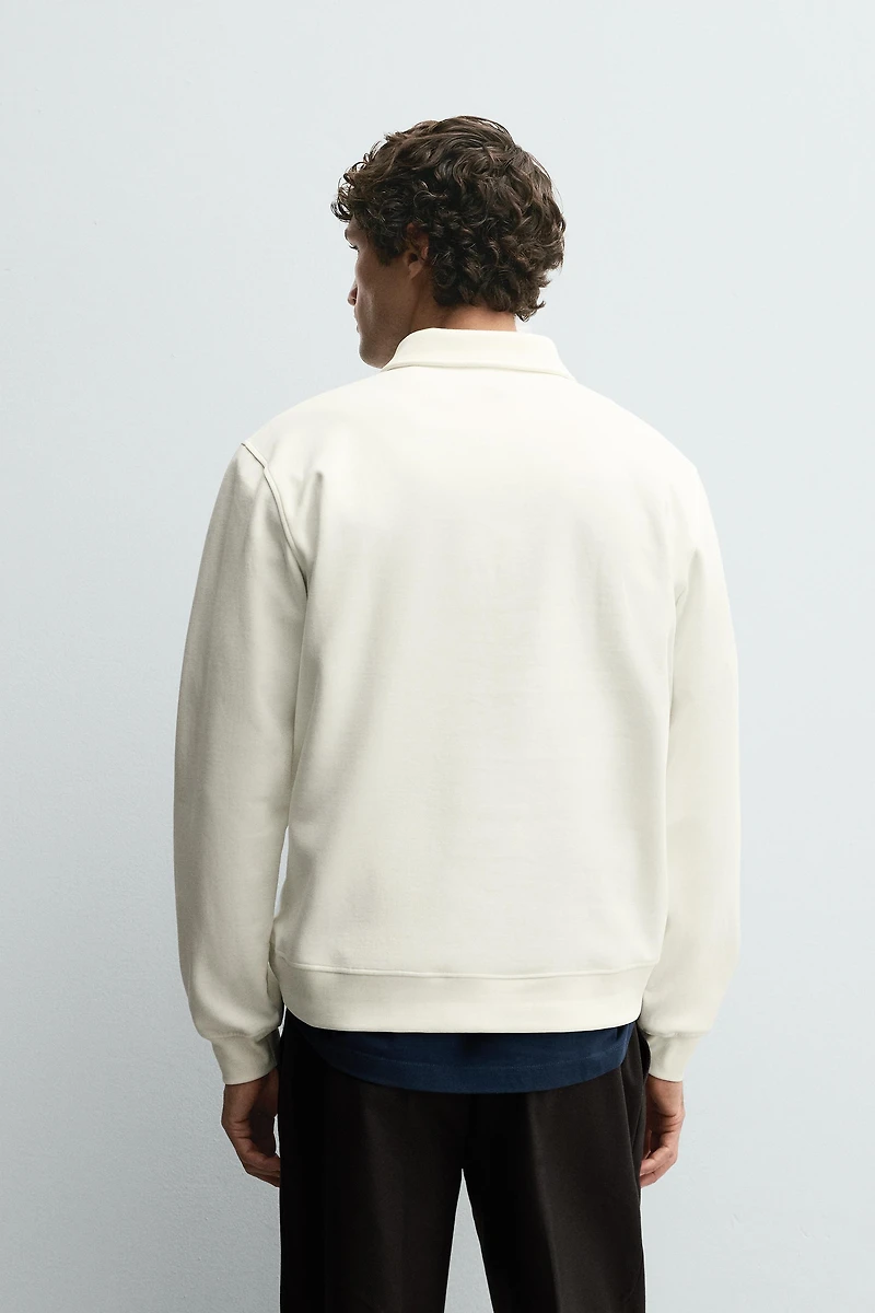 SWEAT POLO INTERLOCK ZIPPÉ
