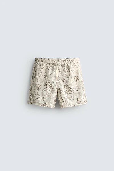 LONG FLORAL PRINT SWIM SHORTS
