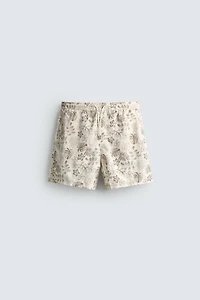 LONG FLORAL PRINT SWIM SHORTS