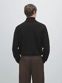 Wool blend knit sweater with high neck