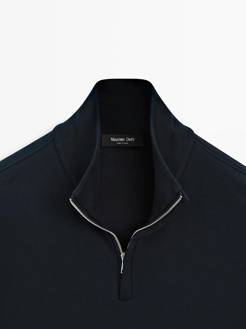 Polo à col montant zippé