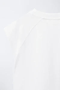 T-SHIRT UNI À MANCHES RAGLAN