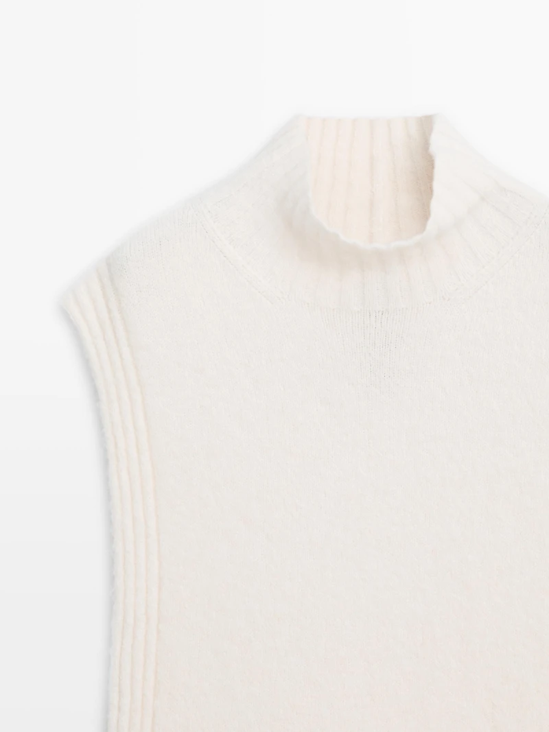 Sleeveless high neck sweater