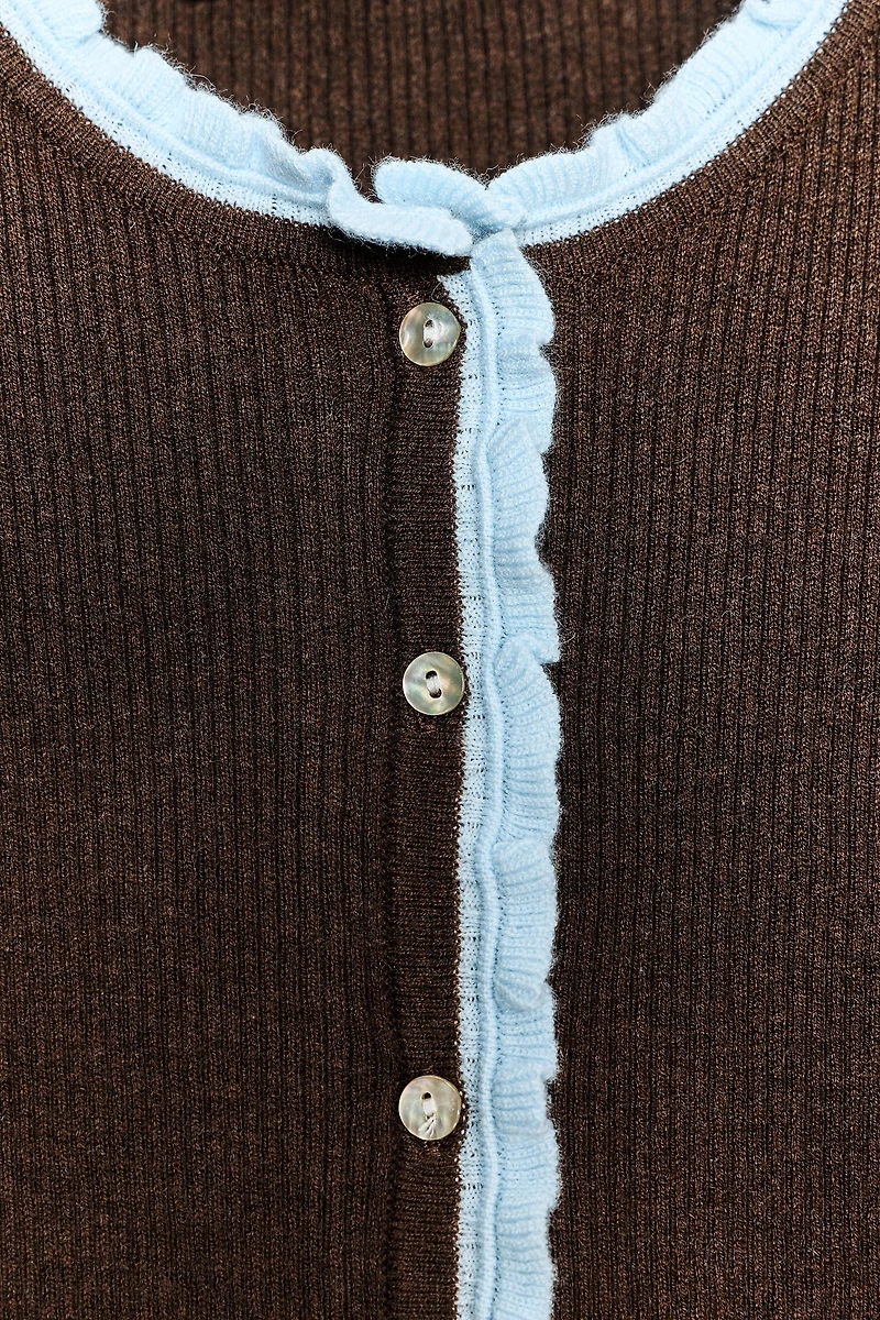 VESTE COMBINÉE EN MAILLE À MANCHES COURTES