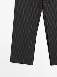 Striped trousers with wrap-style bow detail