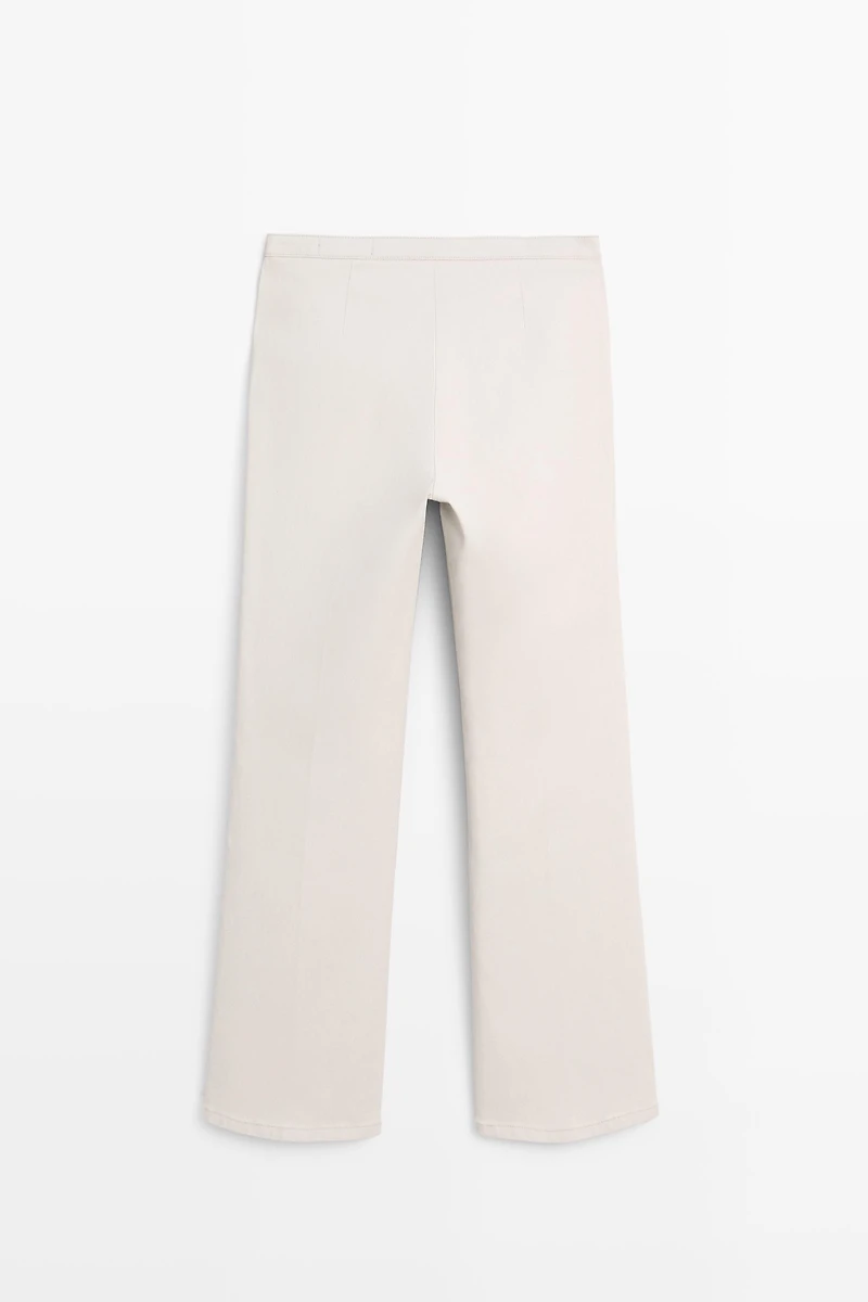 Mid-waist waxed flared pants