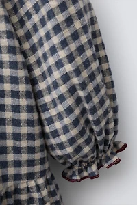 ROBE À CARREAUX ET ONDULINE