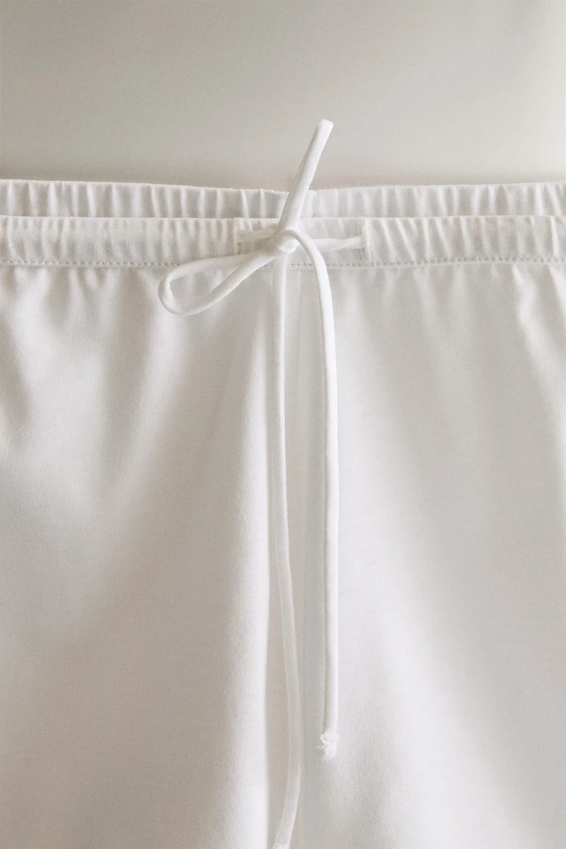 LACE-TRIMMED SHORTS
