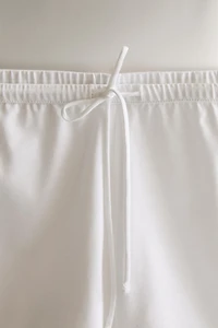 LACE-TRIMMED SHORTS