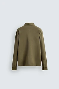 POLO DÉLAVÉ EN PIQUÉ STRUCTURÉ