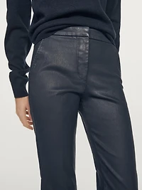 Waxed flare fit trousers