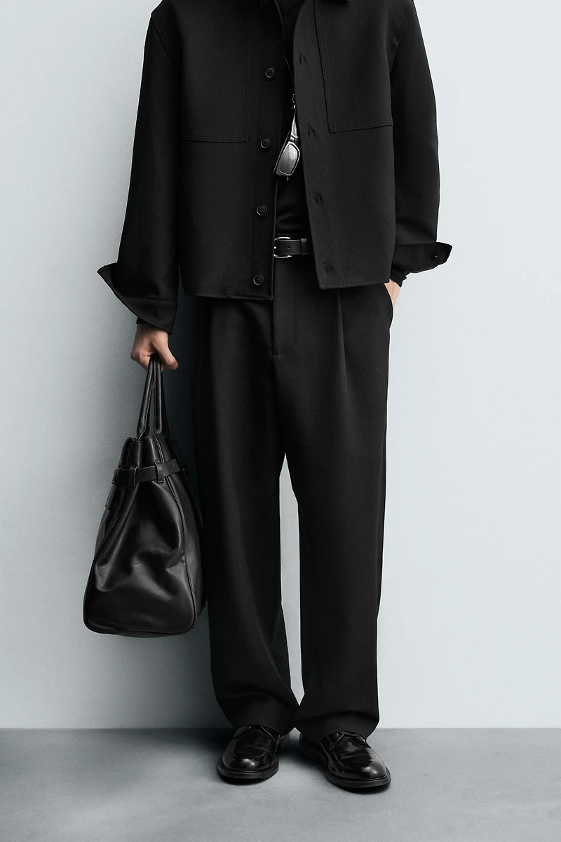 RELAXED FIT PLEATED PANTS