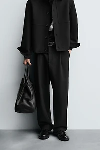RELAXED FIT PLEATED PANTS