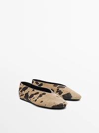 Animal print ballet flats