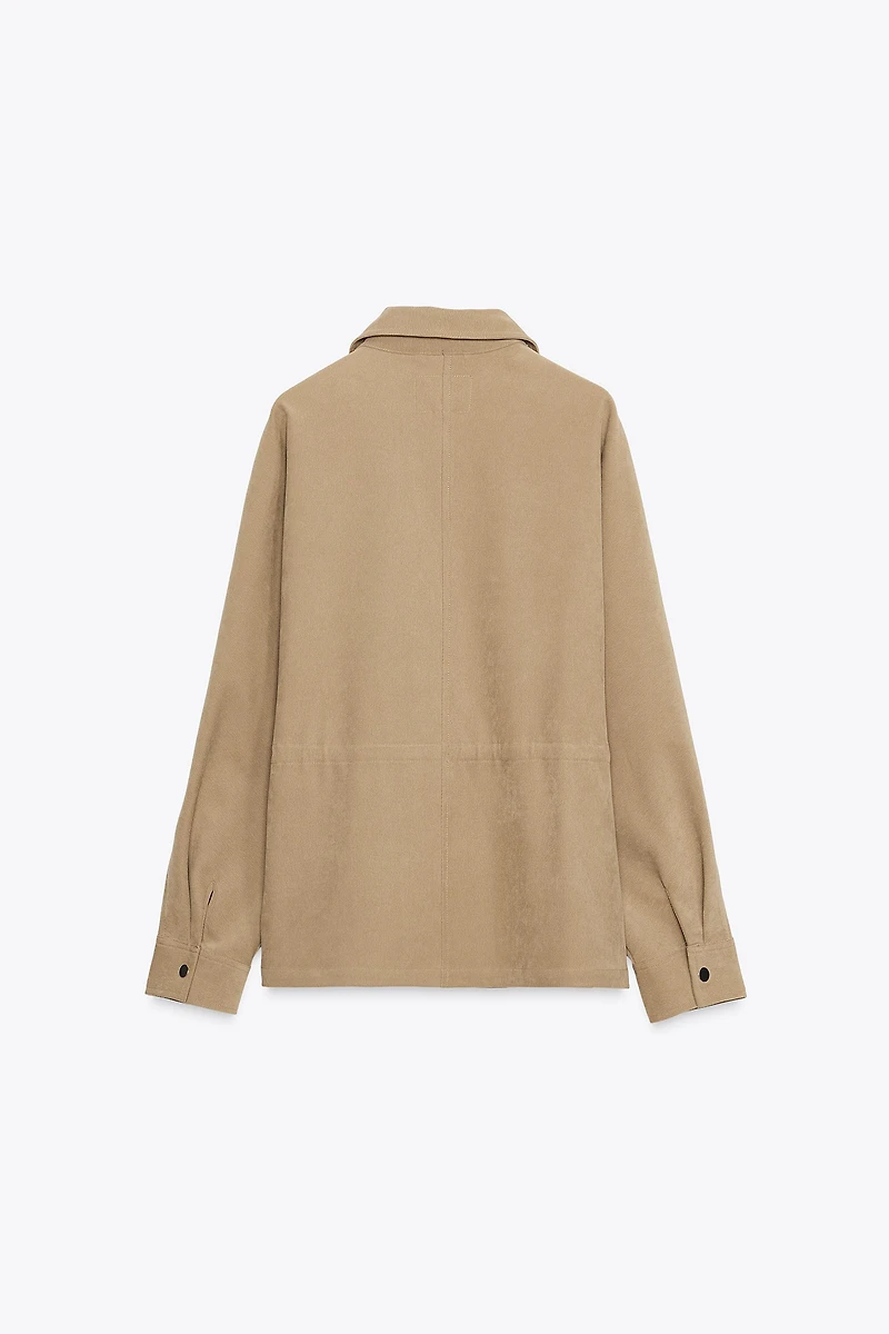 VESTE À POCHES ET TAILLE AJUSTABLE