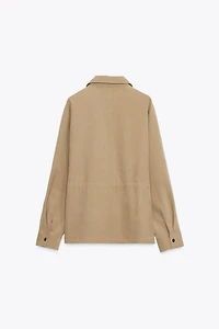 VESTE À POCHES ET TAILLE AJUSTABLE