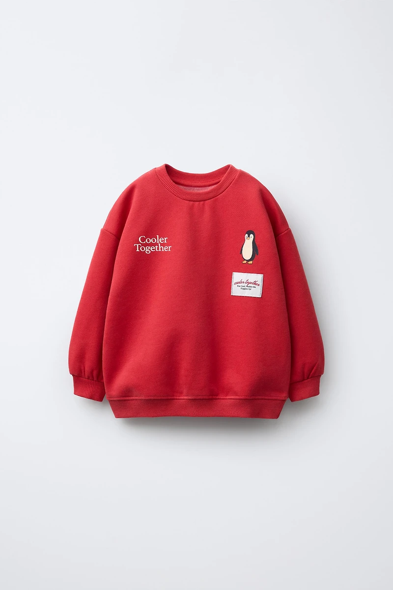 FLOCKED PENGUIN SWEATSHIRT