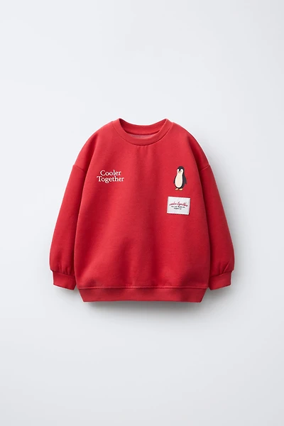 FLOCKED PENGUIN SWEATSHIRT