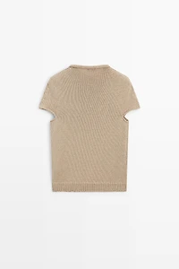 Pull en maille à manches courtes et col roulotté