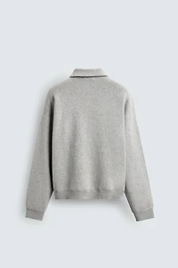POLO EN MAILLE À COL ZIPPÉ