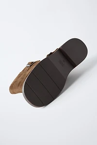 BUCKLED BOOTS